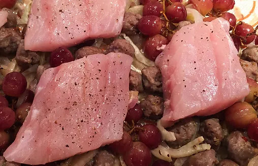 Barramundi Sheet Pan Supper with Fennel, Sausage, and Grapes